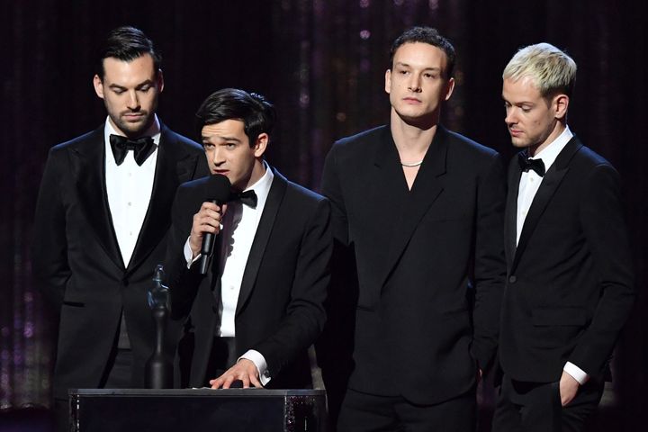 The 1975 collecting one of their two awards