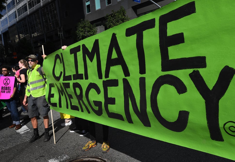 Activists in Los Angeles call for action on climate change on Jan. 26. President Donald Trump has dismissed a repor