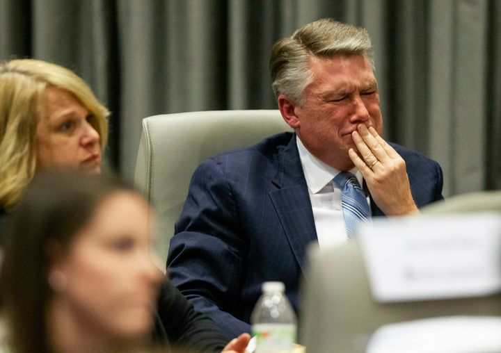 GOP candidate Mark Harris cries as his son testifies at a hearing about allegations of absentee ballot fraud on Wednesday.