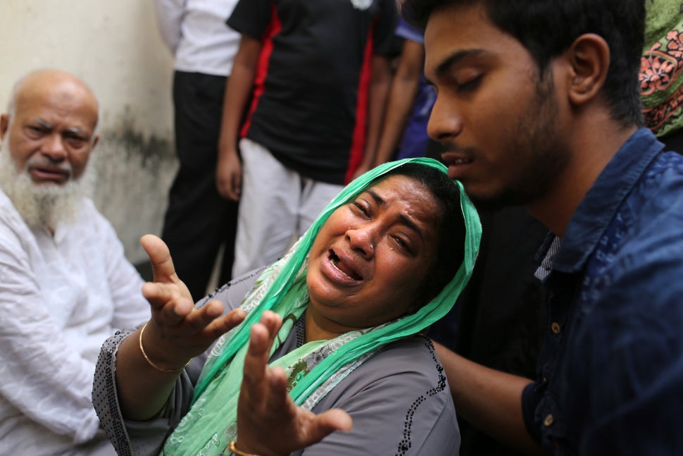 Friends and relatives of the victims mourned in front of the city morgue.
