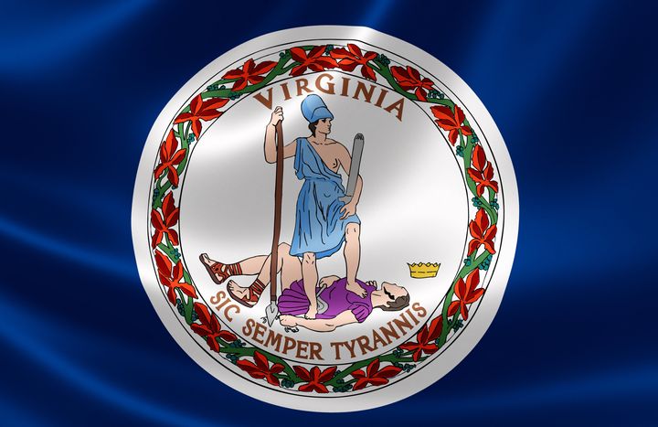 Virginia's seal and flag feature the Roman goddess Virtus triumphantly standing with a single breast exposed. Michelle Renay Sutherland was recreating that pose, her attorney said.