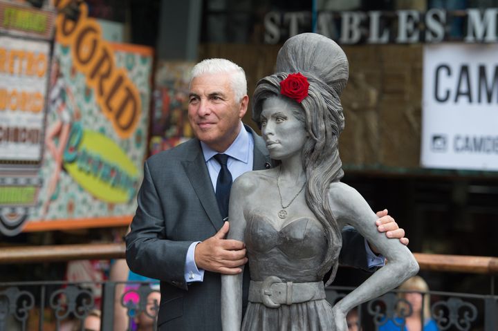 Amy's dad Mitch (seen posing her with a statue of her in 2014) announced the tour five months ago 