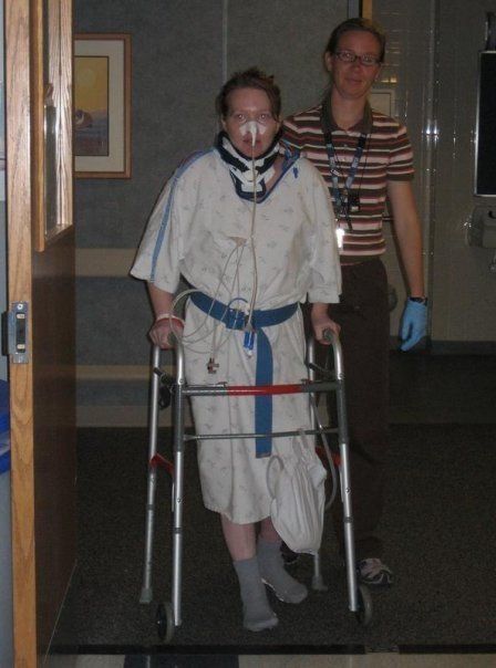Piazza learning to walk again with the help of a physical therapist.