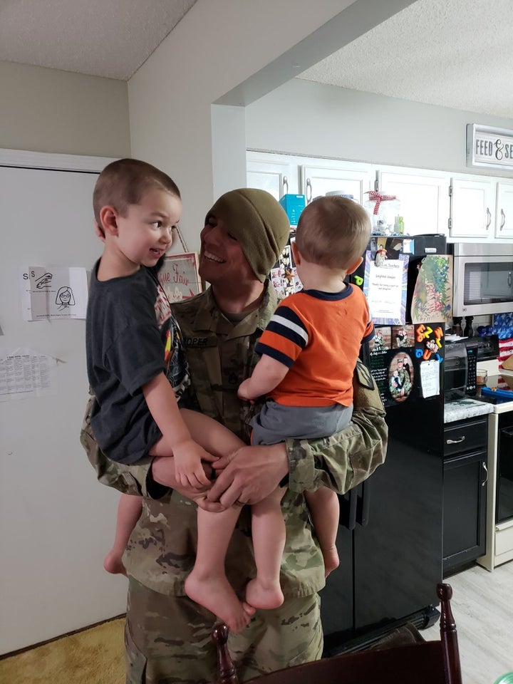 Skyler Cooper and his sons Leighton and Corbett, looking very happy to see each other.