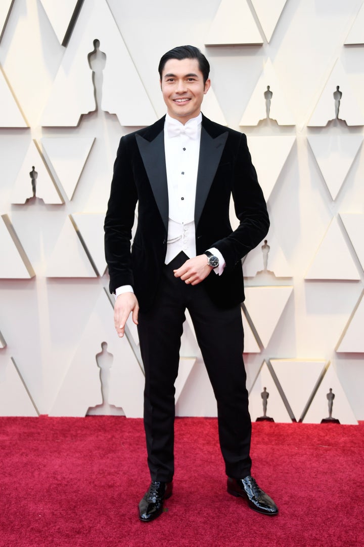 Henry Golding wears a custom Ralph Lauren Purple Label tux.