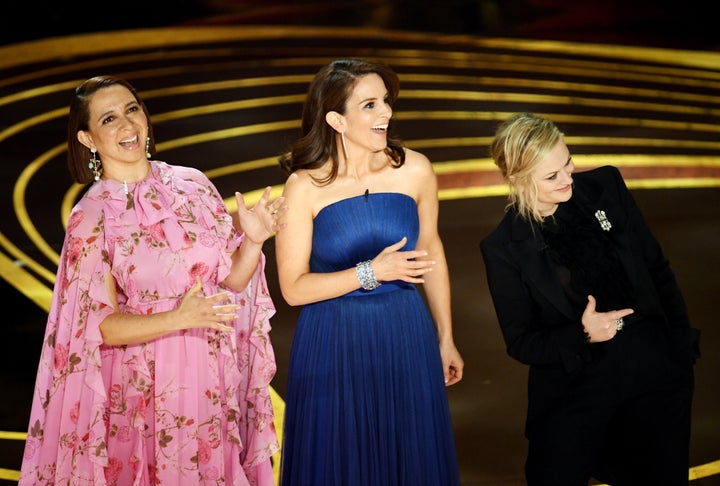 Maya Rudolph, Tina Fey, and Amy Poehler speak onstage during the 91st Annual Academy Awards. 