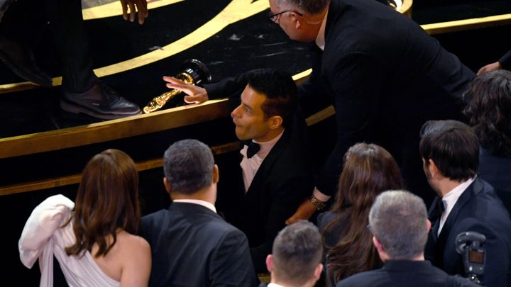 Rami Malek tried to hold on to his Oscar as he fell.