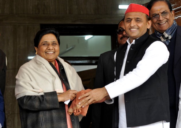 Samajwadi Party president Akhilesh Yadav with Bahujan Samaj Party chief Mayawati in Lucknow, on 15 January