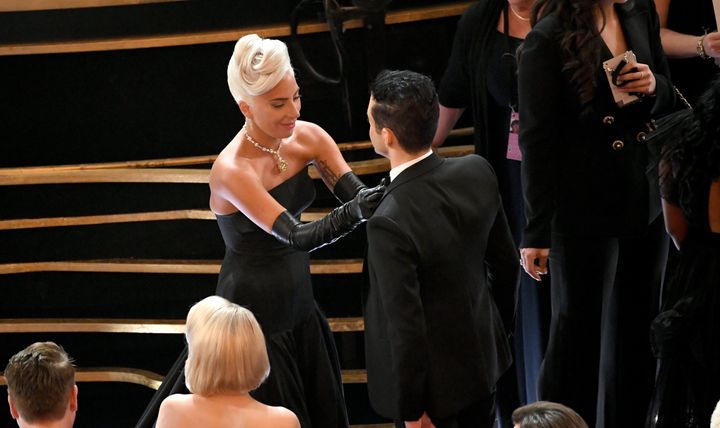 Gaga fixes Malek's tie during Sunday night's Oscars ceremony. 