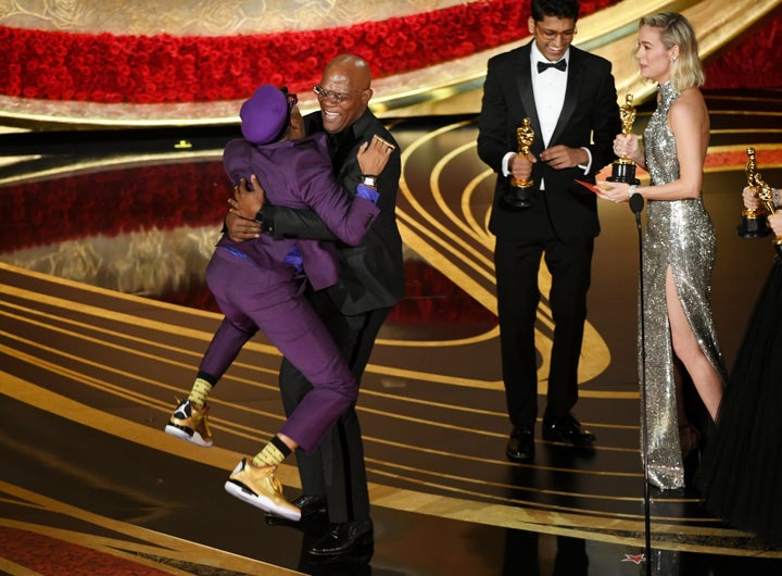 Spike Lee accepts the Best Adapted Screenplay award for 'BlacKkKlansman' from Samuel L. Jackson onstage during the 91st Annua