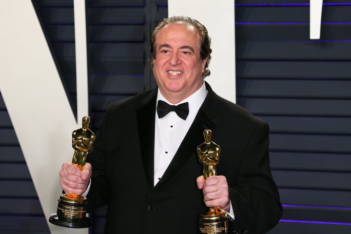 Nick Vallelonga poses with the Oscars for Best Picture and Best Original Screenplay for “Green Book” at the 2019
