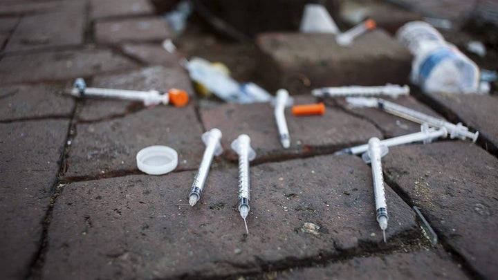 Sharing needles to inject heroin is one way hepatitis C is transmitted. Louisiana and Washington hope to eradicate the disease through innovative payment models adapted from Netflix. 