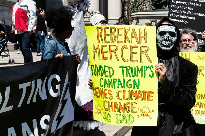 Protesters demand the American Museum of Natural History cut ties with Rebekah Mercer during a demonstration in 2015. Mercer