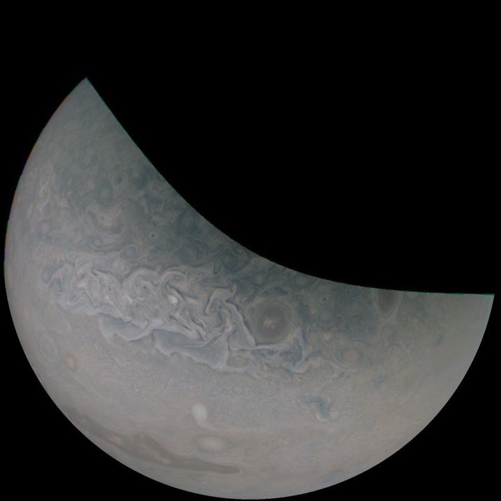 An image captured by Juno during its 18th close pass of Jupiter. Gill color-enhanced this image and rotated it approximately 100 degrees to the right, according to NASA.