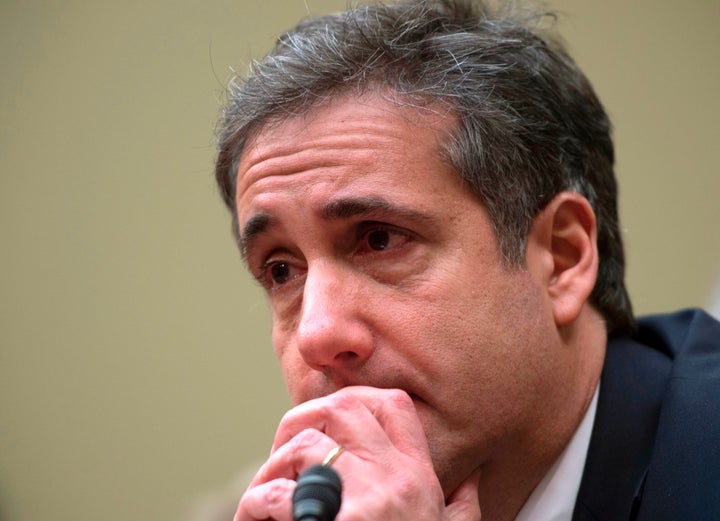 Michael Cohen, Donald Trump's former personal lawyer, tears up after testifying to the House Oversight Committee about the crimes he committed on behalf of and at the direction of the president.