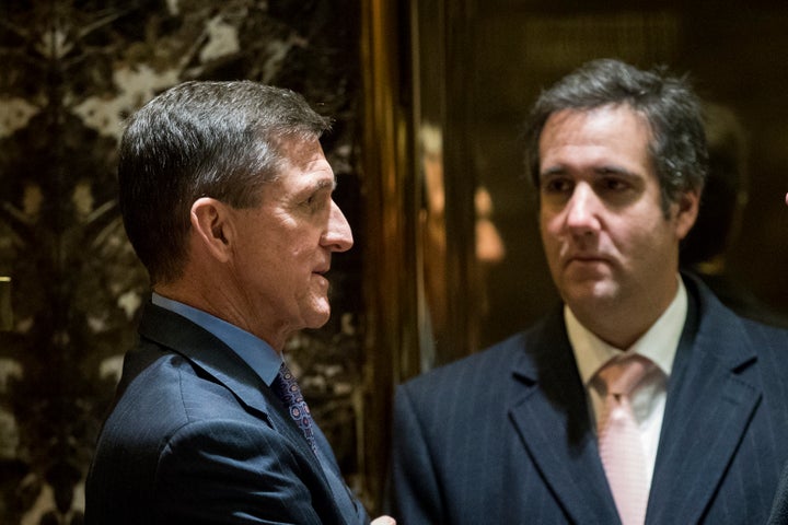 Michael Cohen, right, with former national security adviser Michael Flynn in the Trump Tower lobby after Trump's 2016 election. Both have since pleaded guilty to crimes related to the Trump campaign.