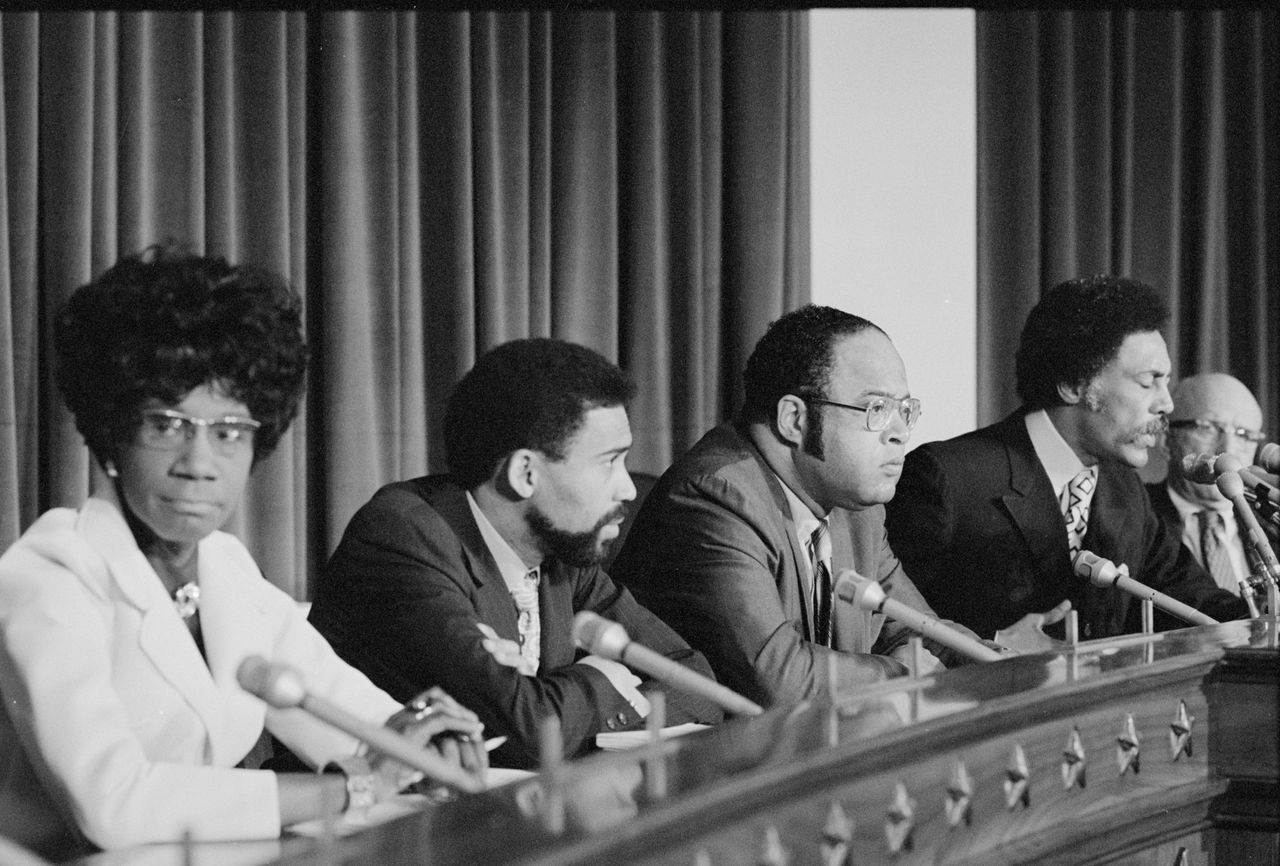 Members of the original Congressional Black Caucus sit on the Congressional dais in 1971. 