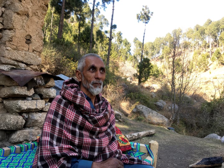 Nooran Shah, 62, talks during an interview with Reuters outside his home which is near to the site where Indian military aircrafts released payload inJaba village, Balakot, Pakistan