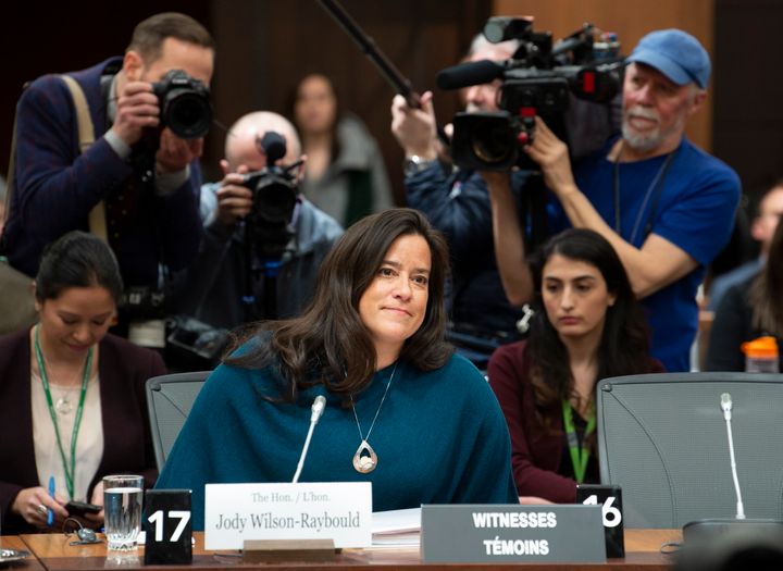 Cameras follow Jody Wilson Raybould as she waits to appear in front of the Justice committee in Ottawa on Wednesday.