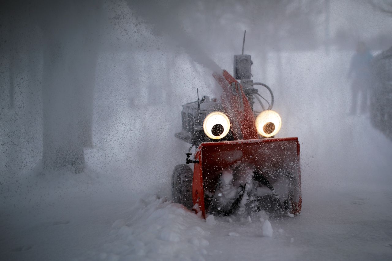 "Chomper," a semiautonomous, GPS-guided snow blower designed and built by MIT research engineer Dane Kouttron, clears snow following an overnight storm in Cambridge, Massachusetts, on Feb. 28, 2019.