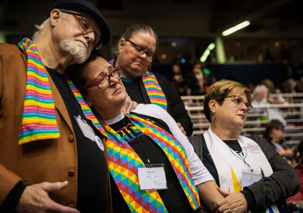 Ed Rowe, left, Rebecca Wilson, Robin Hager and Jill Zundel, react to the defeat of a proposal that would allow LGBT clergy and same-sex marriage within the United Methodist Church at the denomination’s 2019 Special Session of the General Conference in St. Louis on Feb. 26, 2019. America’s second-largest Protestant denomination faces a likely fracture as delegates at the crucial meeting move to strengthen bans on same-sex marriage and ordination of LGBT clergy.