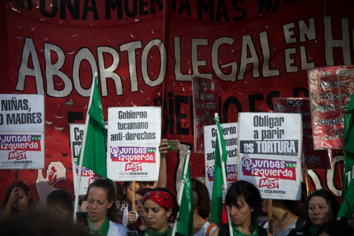 Demonstrators in Buenos Aires protest the country's abortion policy after a child gave birth to an underweight, premature bab