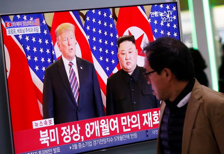 A man watches a TV broadcasting a news report on a meeting between North Korean leader Kim Jong Un and U.S. President Donald Trump, in Seoul, South Korea in February 2019
