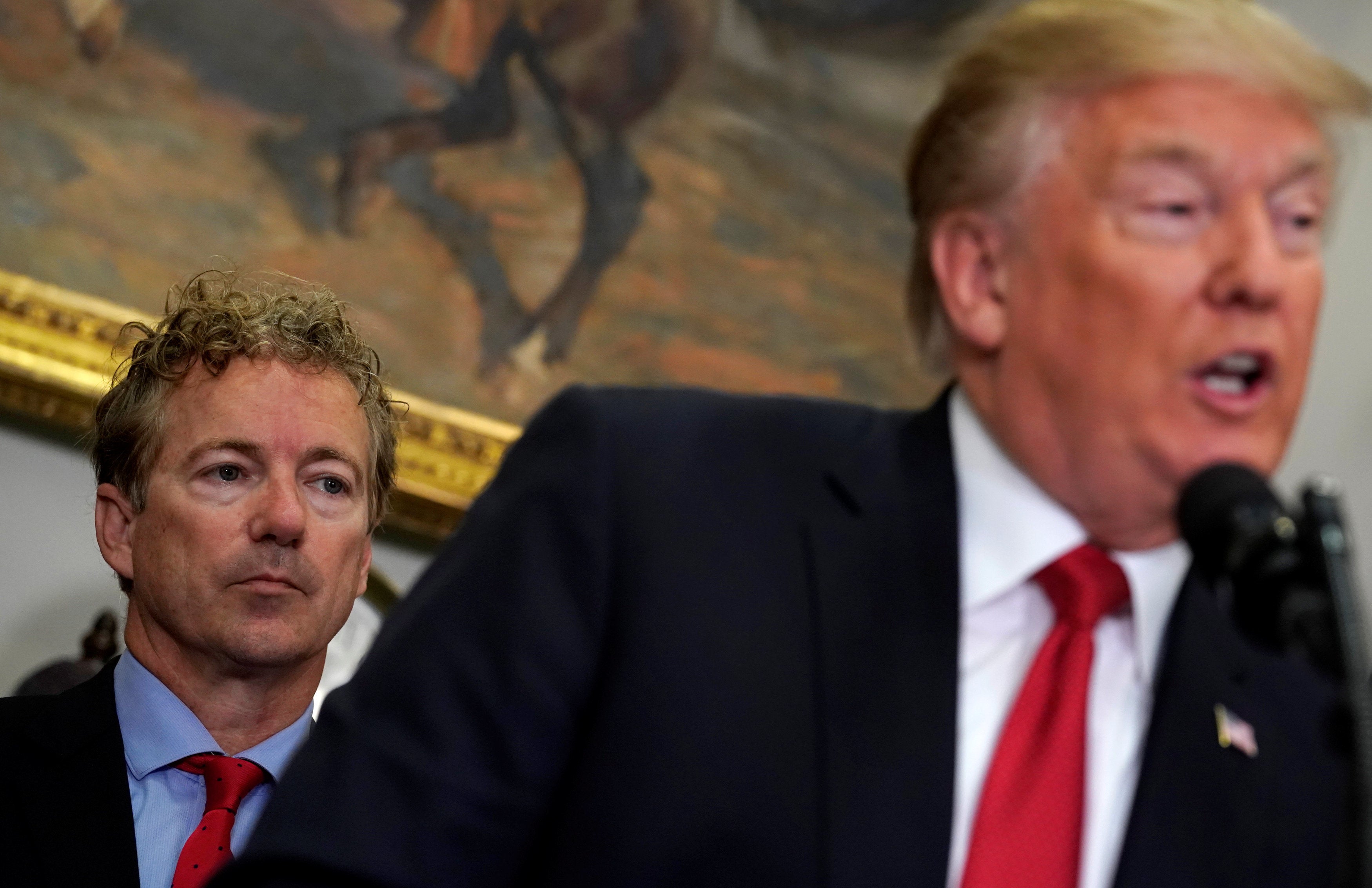 Sen. Rand Paul, R-Ky., listens as President Trump speaks before signing an executive order on health insurance at the White House in Washington, D.C., Oct. 12, 2017. (Kevin Lamarque/Reuters, File)