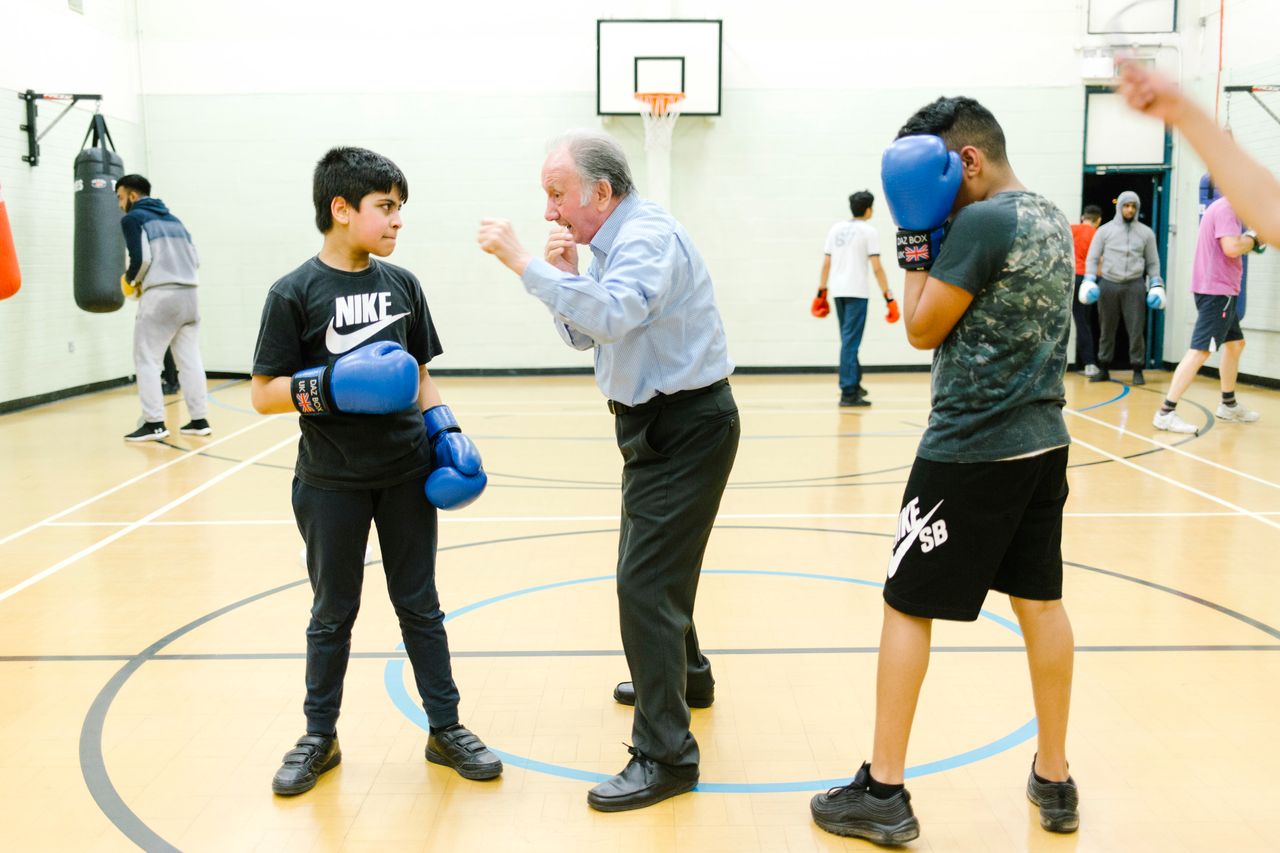 Club Founder Ernie, 81 teaches some young people at Nechells Amateur Boxing Club.