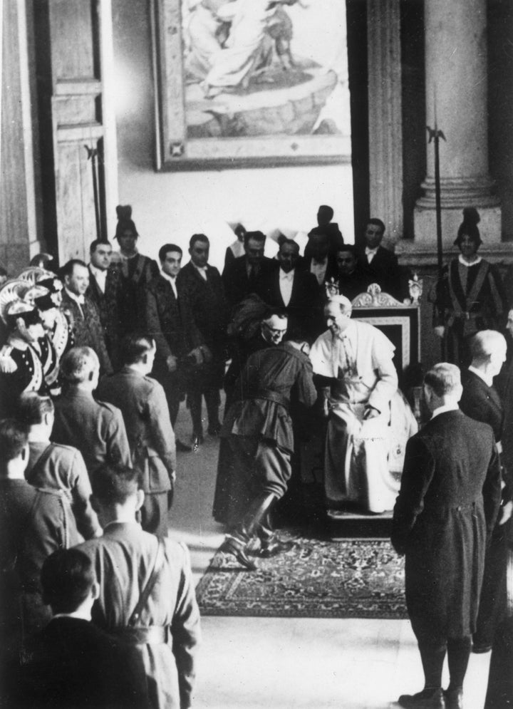 A Spanish soldier kissing Pius' ring on Jun 13, 1939, during a special audience with 3,200 Spanish troops visiting Italy. Jewish groups have long been pushing the Vatican to release its archives on him.