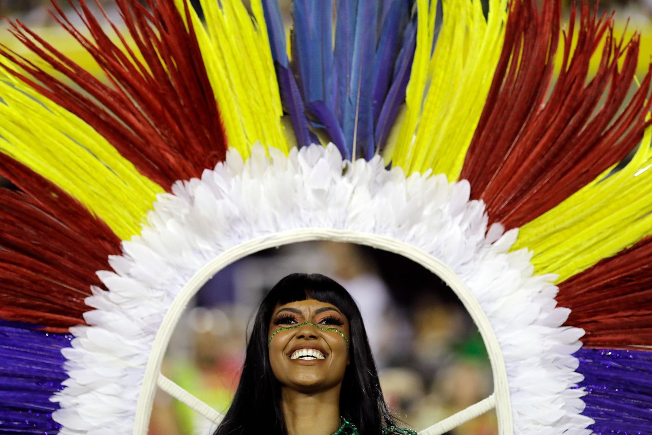 A performer from the Imperatriz Leopoldinense samba school takes part in Carnival.