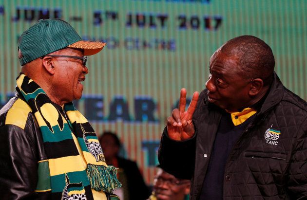 South Africa's President Jacob Zuma (L) chats to his deputy Cyril Ramaphosa ahead of the African National Congress 5th National Policy Conference.