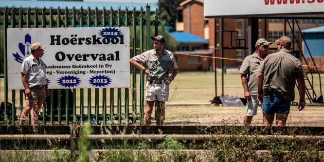 Pupils' parents watch protests against Hoërskool Overvaal in Vereeniging on January 19, 2018.