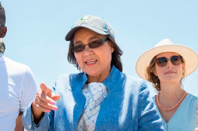 Cape Town City Mayor Patricia de Lille (C) talks to media at a site where the city council has ordered drilling into the aquifer to tap water, in Mitchells Plain, about 25km from the city centre on January 11, 2018 in Cape Town. De Lille is currently fighting for political survival, as her own party, the Democratic Alliance(DA) is investigating her of charges of corruption. / AFP PHOTO / RODGER BOSCH (Photo credit should read RODGER BOSCH/AFP/Getty Images)