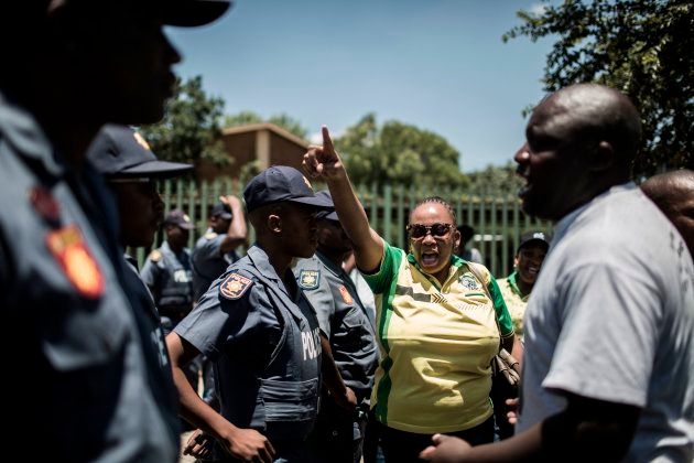 Supporters of the South African ruling party African National Congress (ANC) demonstrate against the language and admission policies outside the Höerskool Overvaal school on January 19, 2018 in Vereeniging, South Africa.