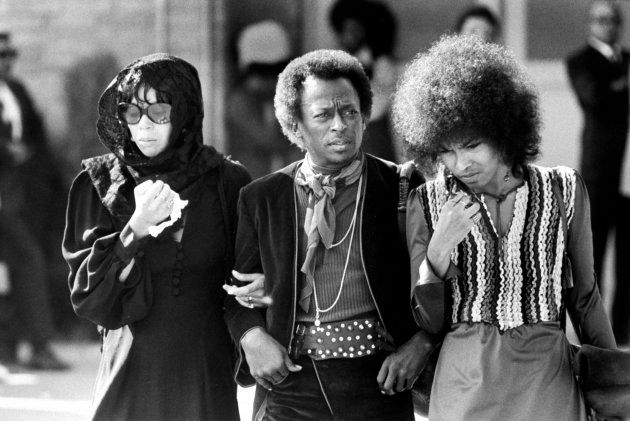 Jazz trumpeter Miles Davis w. his singer wife Betty Mabry (L) & an unident. woman arriving at the funeral of rock guitarist Jimi Hendrix.