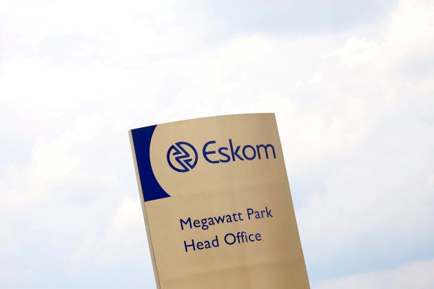 An Eskom logo is seen at the entrance of their head offices in Sunninghill, Sandton, February 24, 2016. South Africa's energy regulator Nersa said on Wednesday it had postponed a decision on tariffs charged by state-run power utility Eskom to March 1 from Feb 25 as it seeks further clarity on diesel costs. REUTERS/Siphiwe Sibeko
