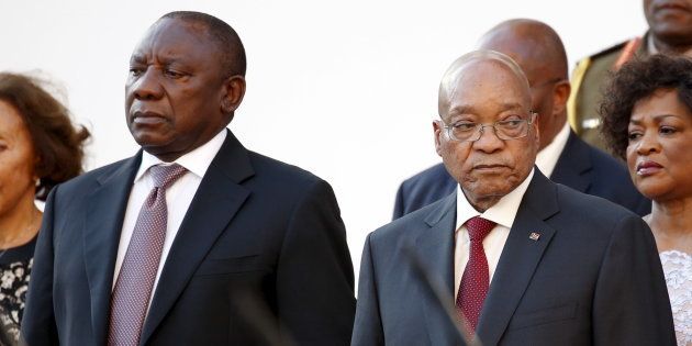 Deputy President Cyril Ramaphosa and President Jacob Zuma stand before the state of the nation address at the opening of Parliament in Cape Town, February 11, 2016.