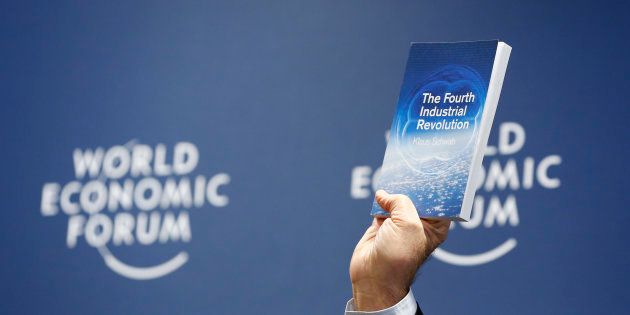 World Economic Forum (WEF) Executive Chairman and founder Klaus Schwab presents his book, 'The Fourth Industrial Revolution', during a news conference in Cologny, near Geneva, January 13, 2016.