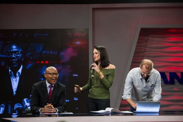 The New Age and ANN7 proprietor Mzwanele Manyi is seen with two investigative journalists, Pauli Van Wyk and Phillip de Wet during the announcement on the shareholding of his company Lodidox on August 30, 2017 in Johannesburg, South Africa. During the live television broadcast, Manyi revealed that he was the sole shareholder in Lodidox the shelf company he bought.