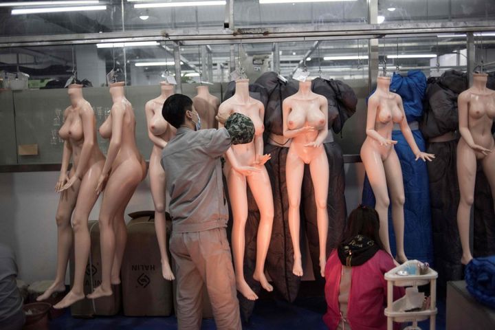 EDITORS NOTE: Graphic content / This photo taken on February 1, 2018 shows a worker preparing silicone dolls at a factory of EXDOLL, a firm based in the northeastern Chinese port city of Dalian. With China facing a massive gender gap and a greying population, a company wants to hook up lonely men and retirees with a new kind of companion: "Smart" sex dolls that can talk, play music and turn on dishwashers. / AFP PHOTO / FRED DUFOUR / TO GO WITH China-sex-lifestyle, FOCUS by Joanna CHIUFRED DUFOUR/AFP/Getty Images