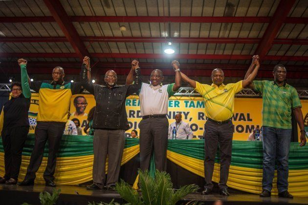 (From L) African National Congress (ANC) top six elected, Deputy secretary general Jessie Duarte, secretary Ace Magashule, National Chair Gwede Mantashe, President Cyril Ramaphosa, Deputy President David Mabuza and treasurer general Paul Mashatile celebrate on December 18, 2017 at NASREC Expo Centre in Johannesburg during the 54th ANC National Conference.