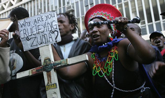 Zuma supporters outside the court in 2006 waiting to hear the outcome of Zuma's trial for rape.