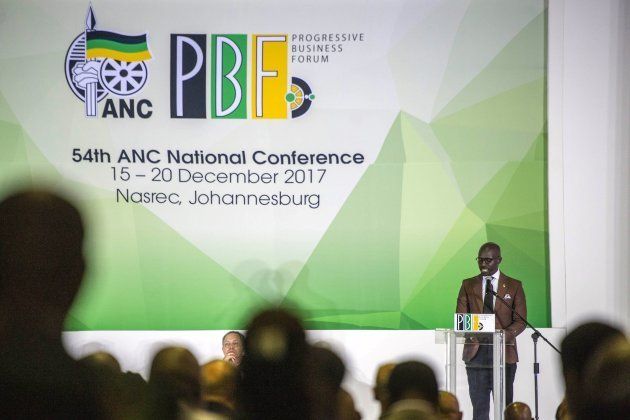 South African Finance Minister Malusi Gigaba (R) gives a speech during the Progressive Business Forum, as part of the 54th South Africa's ruling African National Congress (ANC) National Conference in Nasrec, a suburb of Johannesburg, on December 16, 2017.