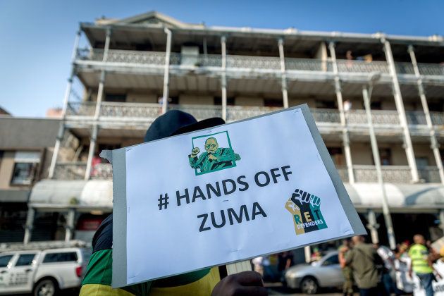 Supporters of Jacob Zuma rally prior to his appearance in the KwaZulu-Natal High Court on corruption charges, in Durban.