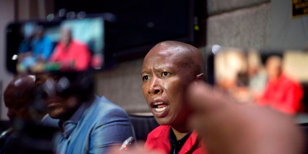 Economic Freedom Fighters (EFF) party leader Julius Malema speaks during a press conference with other opposition leaders regarding their position on the embattled South African president's refusal to resign.