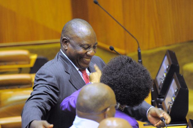 Cyril Ramaphosa enjoys the moment of applause as he is elected President of South Africa at the parliament in Cape Town, South Africa February 15, 2018. REUTERS/Rodger Bosch/Pool