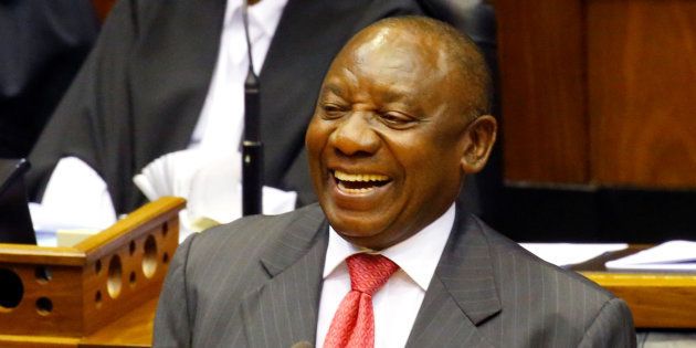 President Cyril Ramaphosa smiles as he addresses MPs after being elected president in Parliament in Cape Town, South Africa, February 15, 2018.
