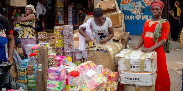 Traders sell their wares at Makola market in Accra, Ghana.