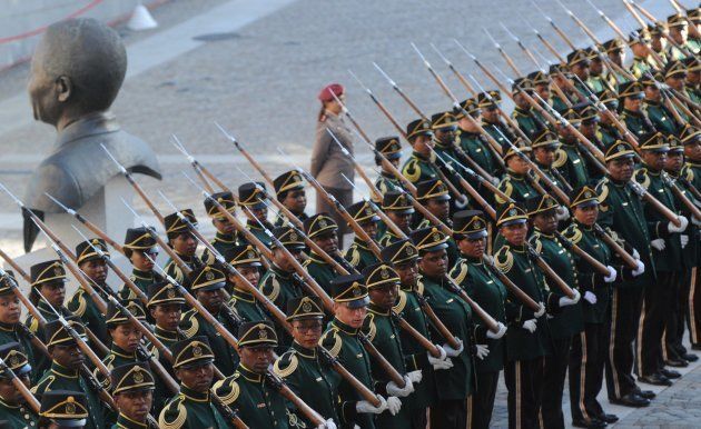Soldiers stand during a ceremony ahead of South Africa's newly-minted president National address at the Parliament in Cape Town, on February 16, 2018. The State of the Nation address is an annual mix of political pageantry and policy announcements, but the flagship event was postponed last week as Zuma battled to stay in office. / AFP PHOTO / X00388 / Brenton GEACH (Photo credit should read BRENTON GEACH/AFP/Getty Images)